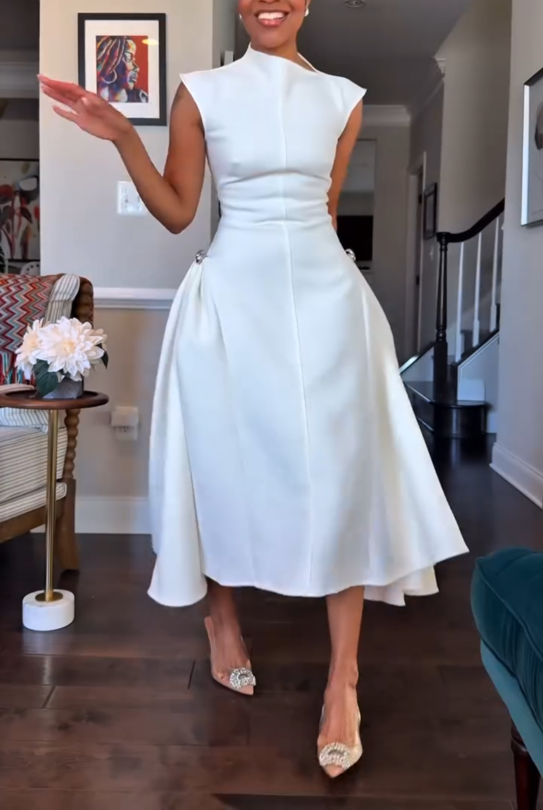 White sleeveless irregular neckline dress
