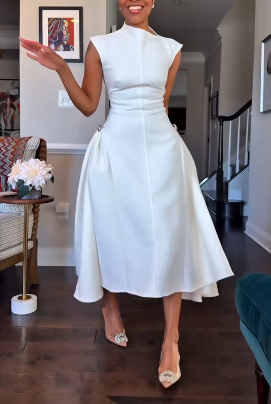 White sleeveless irregular neckline dress